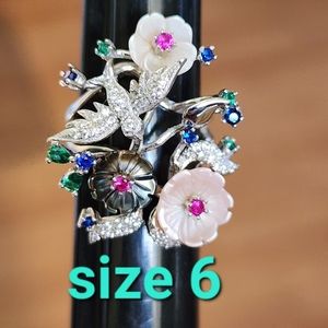 Sterling silver ring size 6 with flowers and a bird real diamonds and gemstones